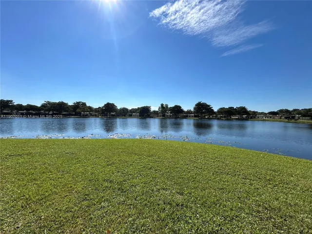a view of a lake with a city