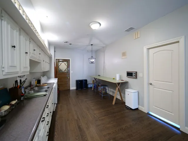a view of a bathroom with shower