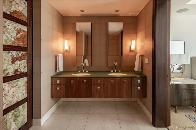 a bathroom with a sink and mirror