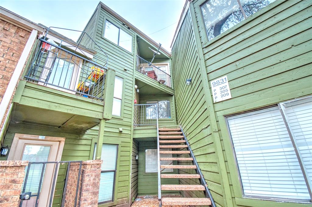 9831 Walnut Street, Unit 209 Dallas, TX 75243 - Photo 23 of 26 a front view of a building