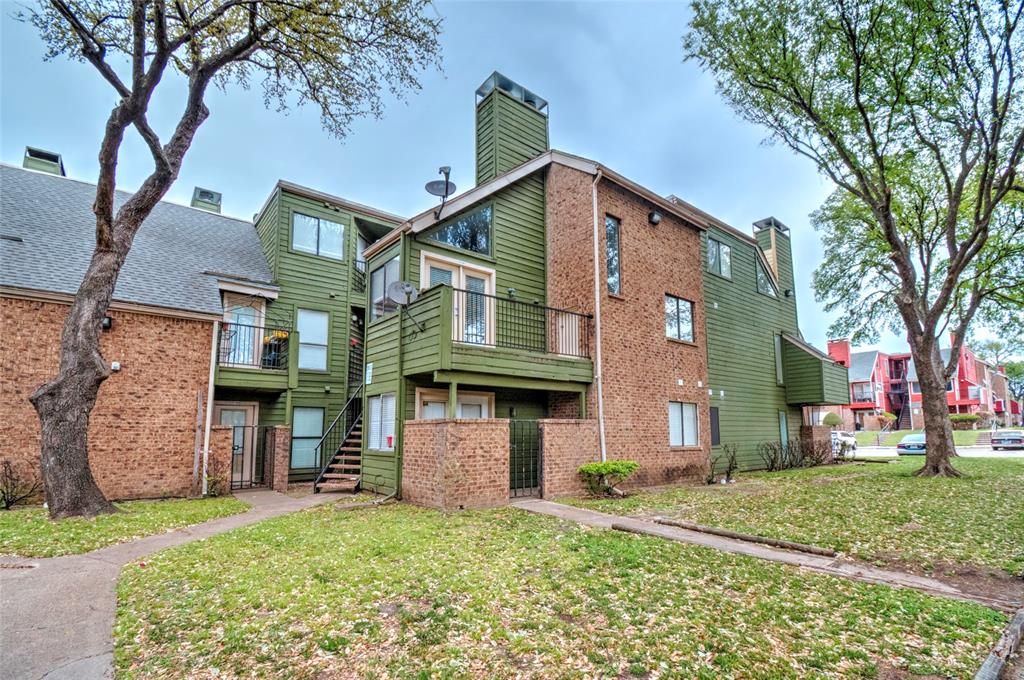 9831 Walnut Street, Unit 209 Dallas, TX 75243 - Photo 26 of 26 front view of a house with a yard