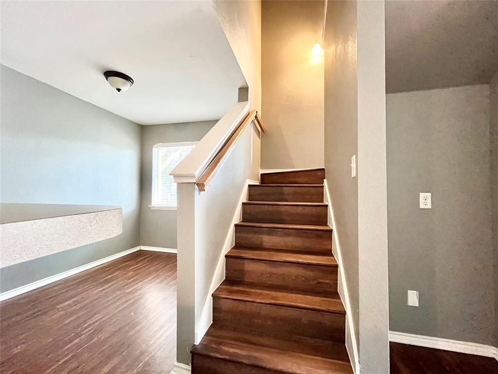 9831 Walnut Street, Unit 209 Dallas, TX 75243 - Photo 5 of 26 a view of entryway with wooden floor