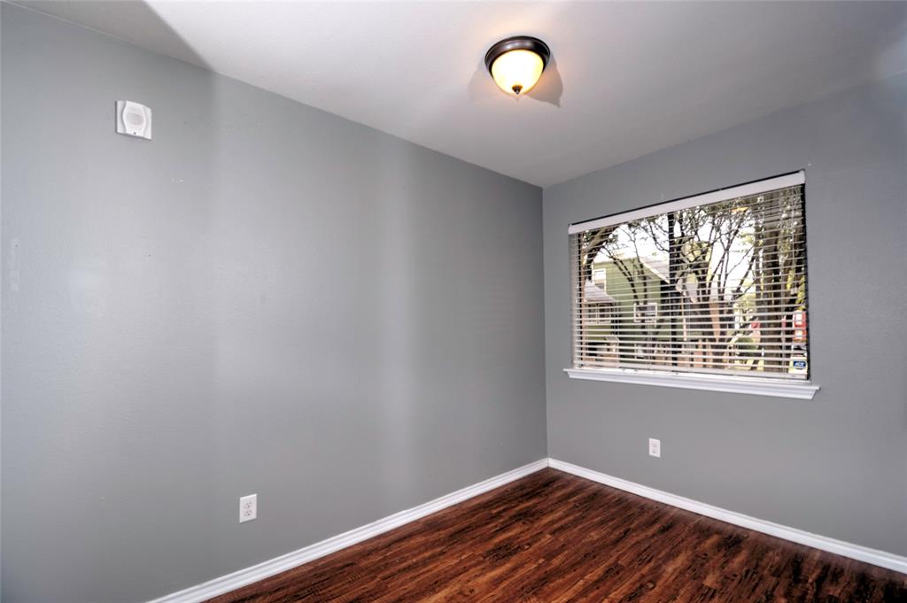 9831 Walnut Street, Unit 209 Dallas, TX 75243 - Photo 8 of 26 a view of empty room with window