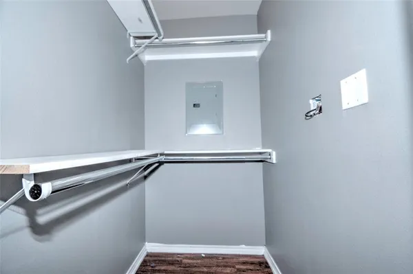 a view of a room with rack on the wall