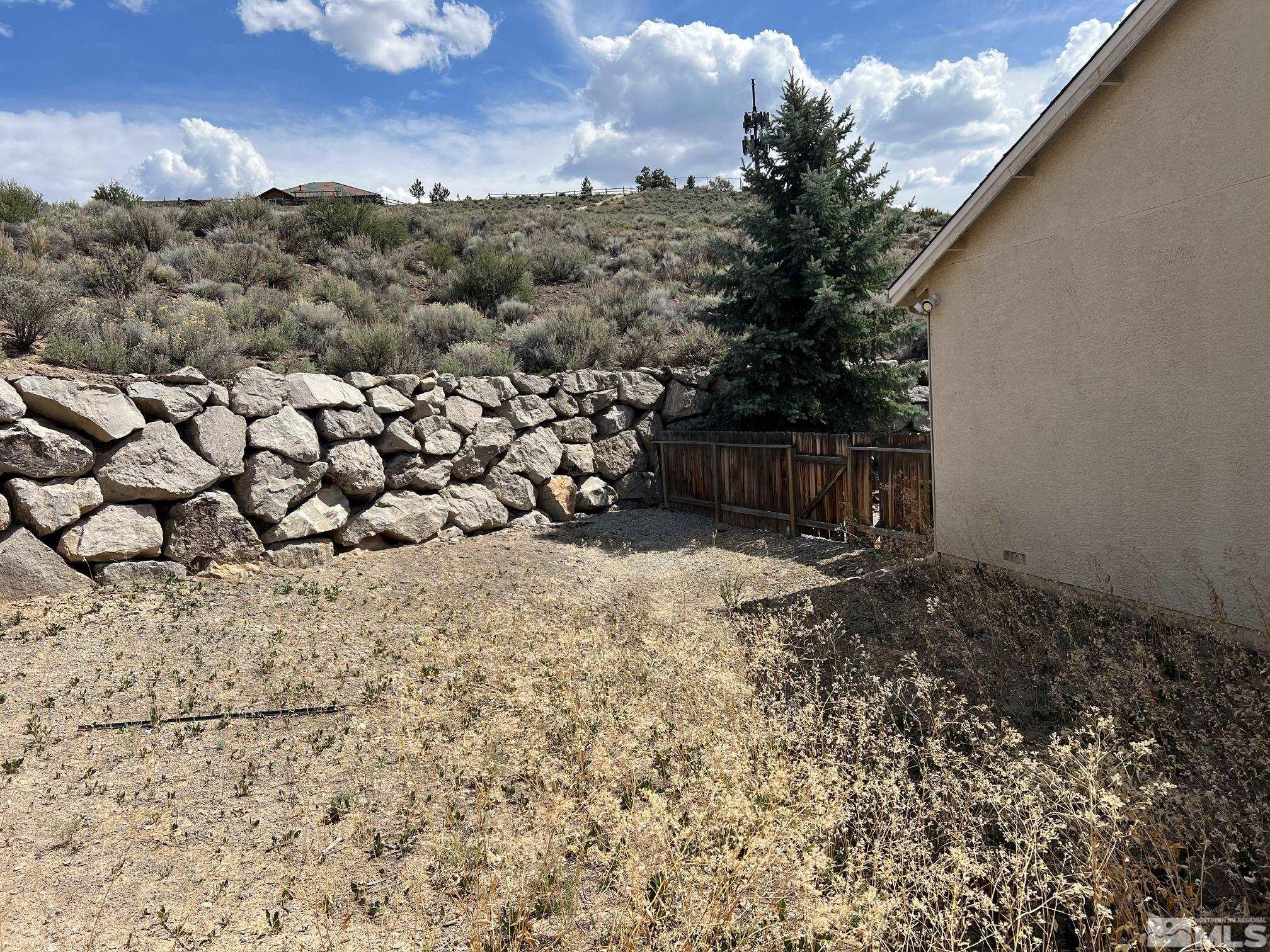 5458 Zeppelin Court Reno, NV 89523 - Photo 24 of 36 a view of a backyard