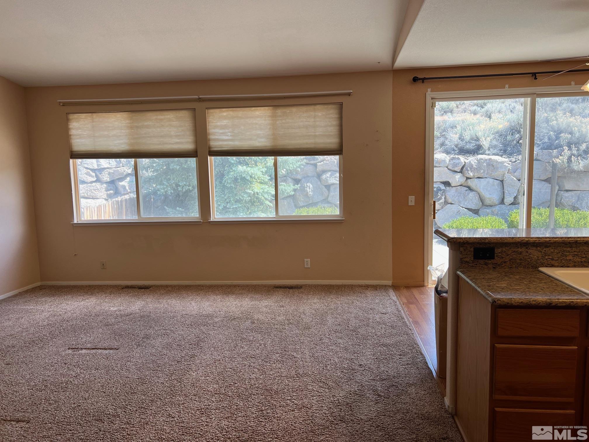 5458 Zeppelin Court Reno, NV 89523 - Photo 6 of 36 an empty room with a window