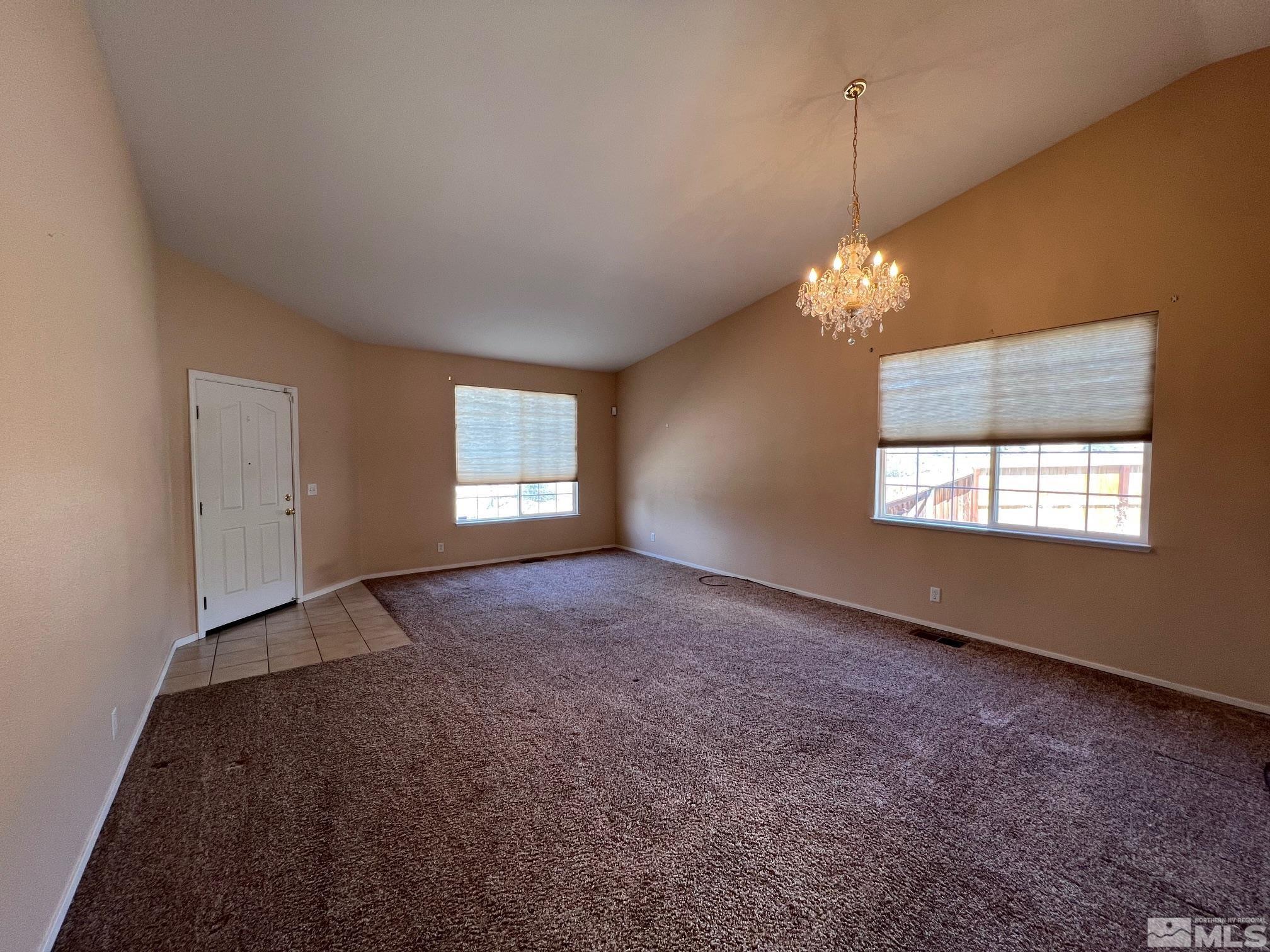 5458 Zeppelin Court Reno, NV 89523 - Photo 9 of 36 a view of an empty room with a window