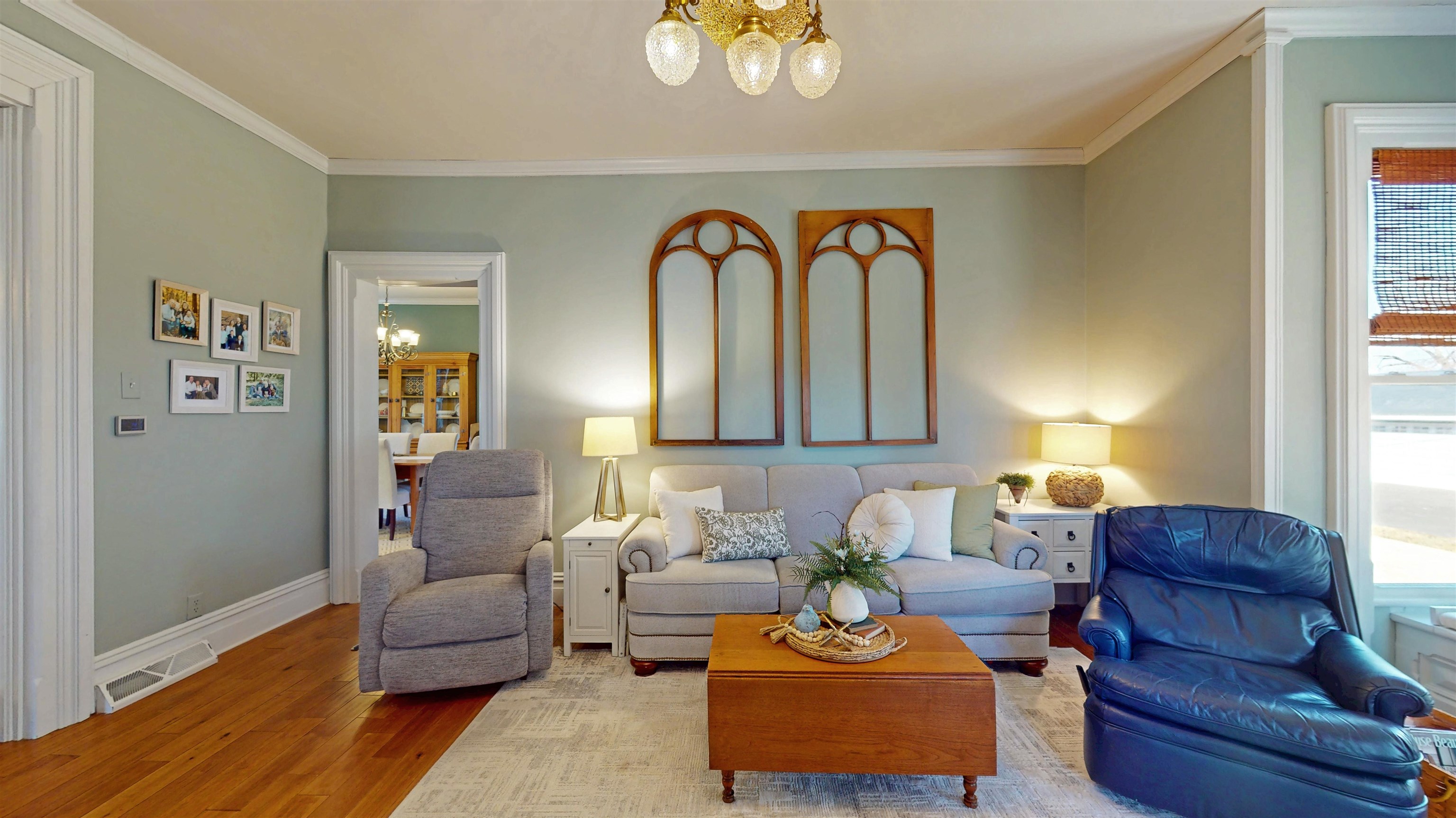 629 East Locust Street Lanark, IL 61046 - Photo 12 of 87 a living room with furniture and a potted plant