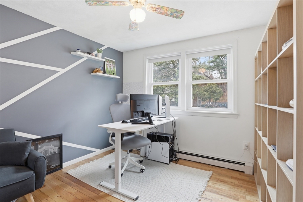 24 Clark Street Salem, MA 01970 - Photo 14 of 38 a work room with furniture and windows