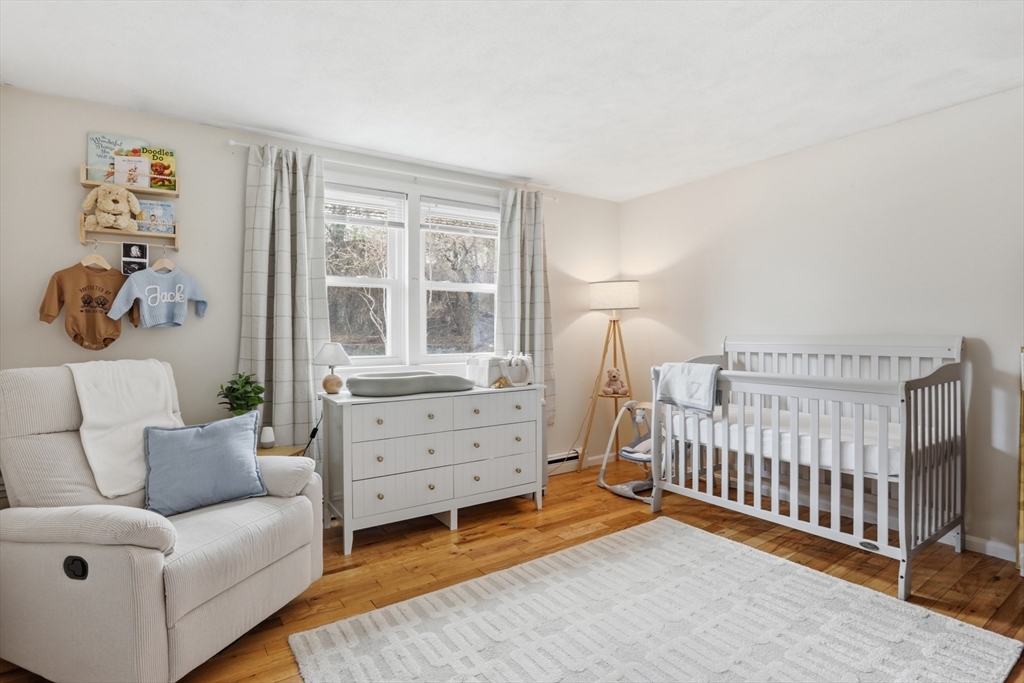 24 Clark Street Salem, MA 01970 - Photo 16 of 38 a bedroom with furniture and a window