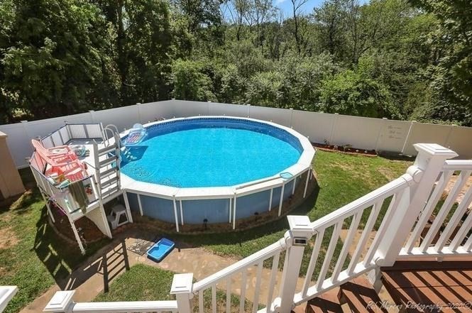 24 Clark Street Salem, MA 01970 - Photo 35 of 38 a view of a chairs and table in the roof deck