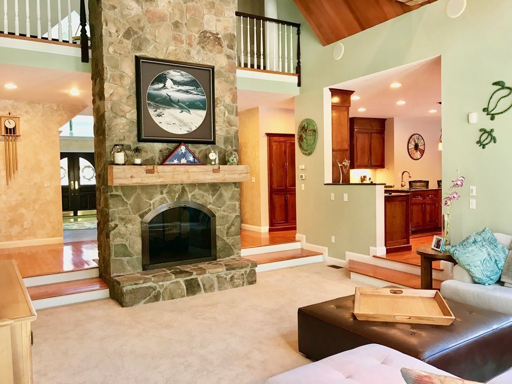 11 Kate's Lane Boxford, MA 01921 - Photo 13 of 30 a living room with furniture and a fireplace