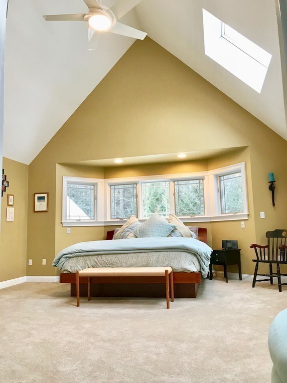 11 Kate's Lane Boxford, MA 01921 - Photo 19 of 30 a bedroom with a bed and a table