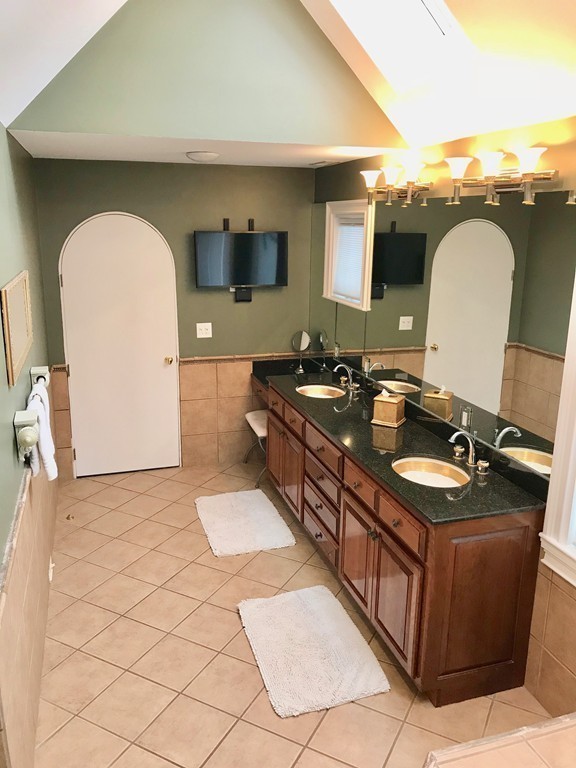 11 Kate's Lane Boxford, MA 01921 - Photo 22 of 30 a bathroom with a sink and a mirror