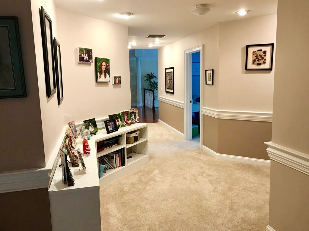11 Kate's Lane Boxford, MA 01921 - Photo 28 of 30 a view of a living room with furniture and flat screen tv