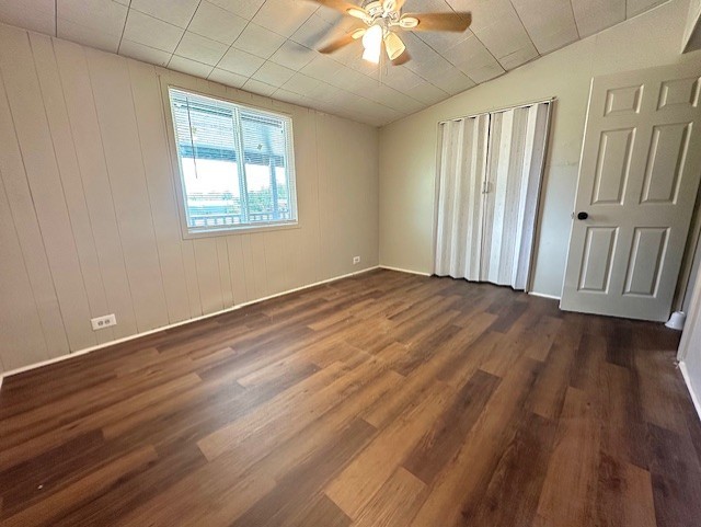 123 Stavena Road, Unit 3 Wharton, TX 77488 - Photo 6 of 9 an empty room with wooden floor fan and windows