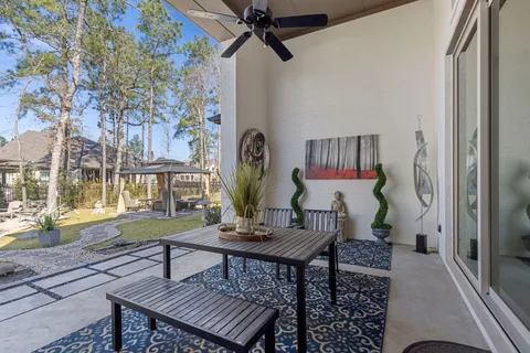 a living room with furniture and a clock