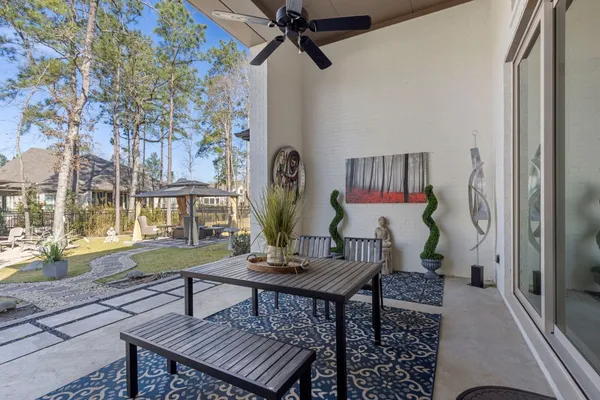 a living room with furniture and a clock