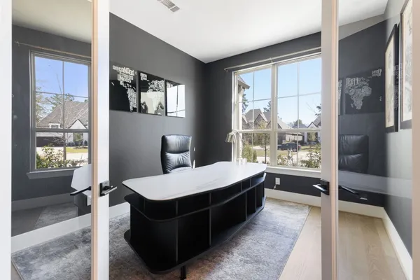 a room with a bed and a window