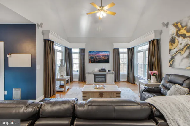 a bathroom with a sink a mirror and a shower