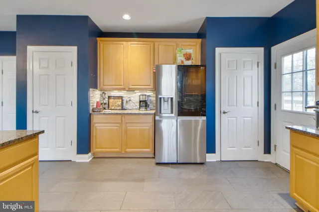 a very nice looking room with a couch and a walk in closet