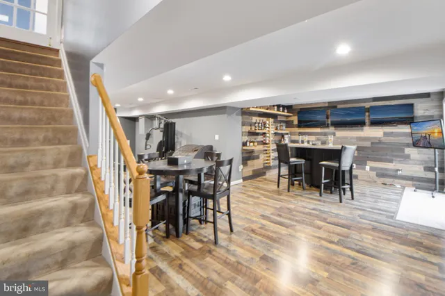 a bedroom with a large bed and a view of bedroom