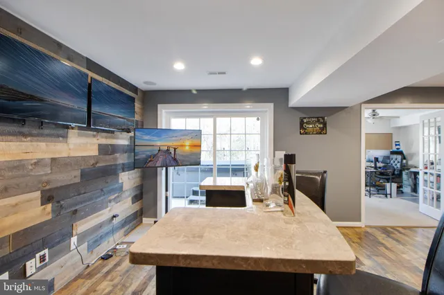 a bathroom with a sink a vanity and a mirror