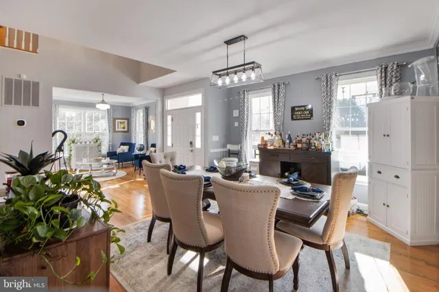 a bathroom with a sink a toilet and shower curtain