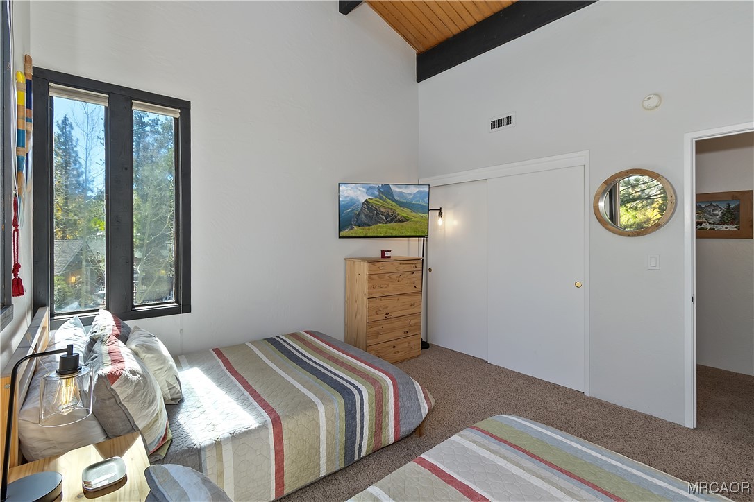 39343 Aurora Road Big Bear Lake, CA 92315 - Photo 31 of 50 a bedroom with bed and a window