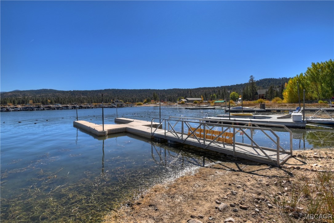 39343 Aurora Road Big Bear Lake, CA 92315 - Photo 36 of 50 a view of swimming pool with a table and chairs