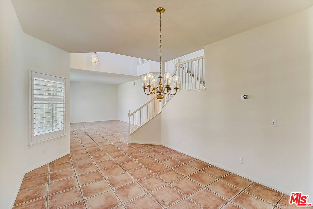 41908 Pico Way Palmdale, CA 93551 - Photo 8 of 35 a view of a room with window and stairs