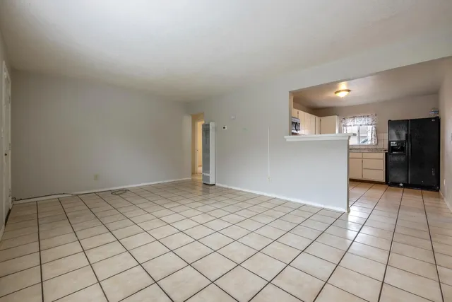 a view of a room & utility room