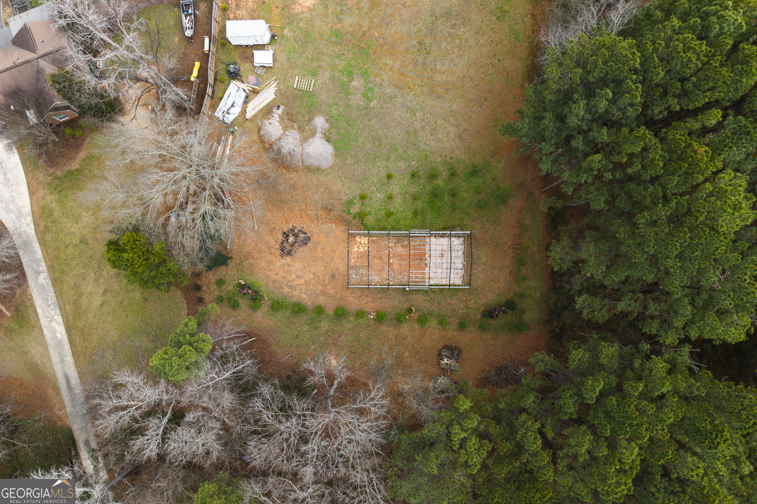 1462 Bethany Road Covington, GA 30016 - Photo 7 of 13 a backyard of a house with a yard and outdoor seating