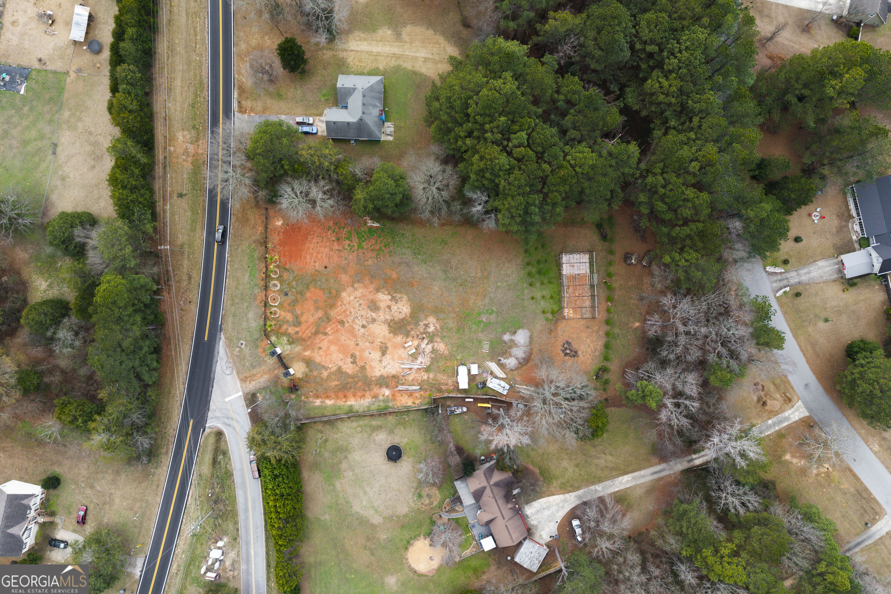 1462 Bethany Road Covington, GA 30016 - Photo 8 of 13 an aerial view of residential houses with outdoor space