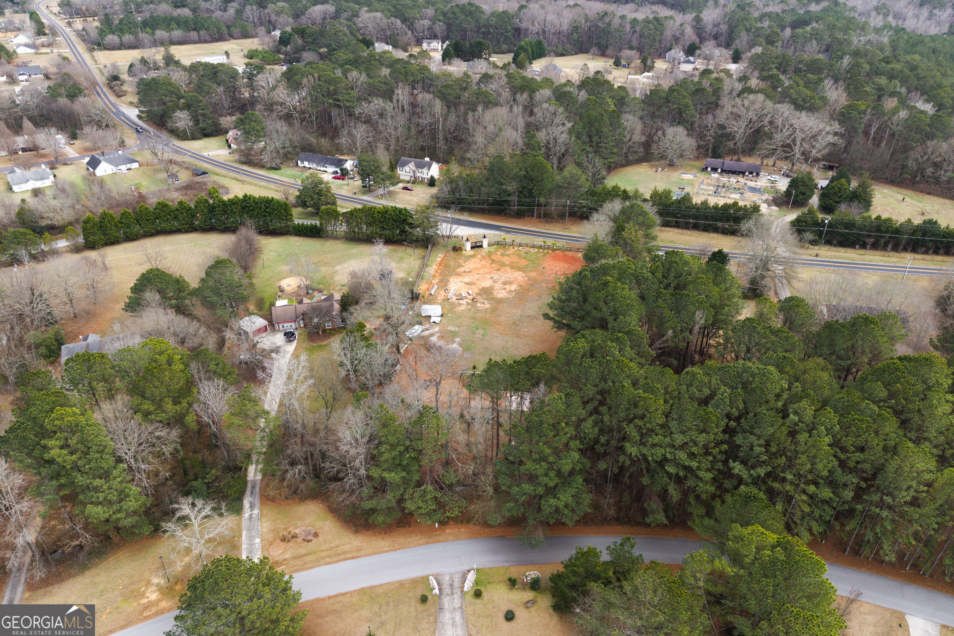 1462 Bethany Road Covington, GA 30016 - Photo 10 of 13 an aerial view of a house with a yard and lake view