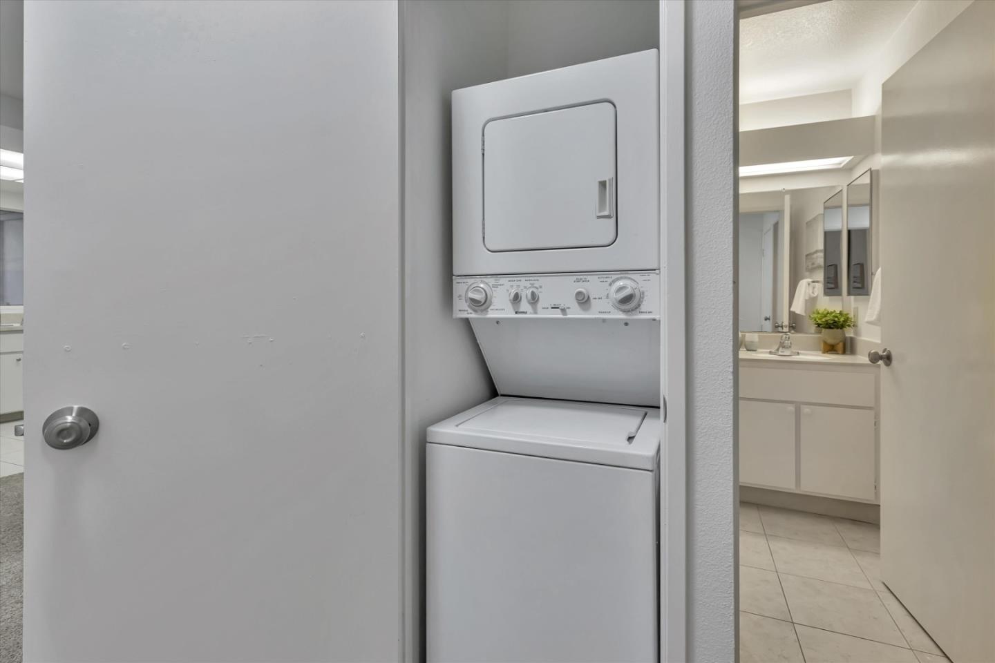 563 Shadow Dance Drive San Jose, CA 95110 - Photo 22 of 30 a utility room with dryer and washer