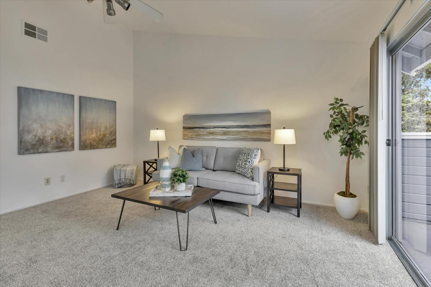 563 Shadow Dance Drive San Jose, CA 95110 - Photo 5 of 30 a living room with furniture and a potted plant