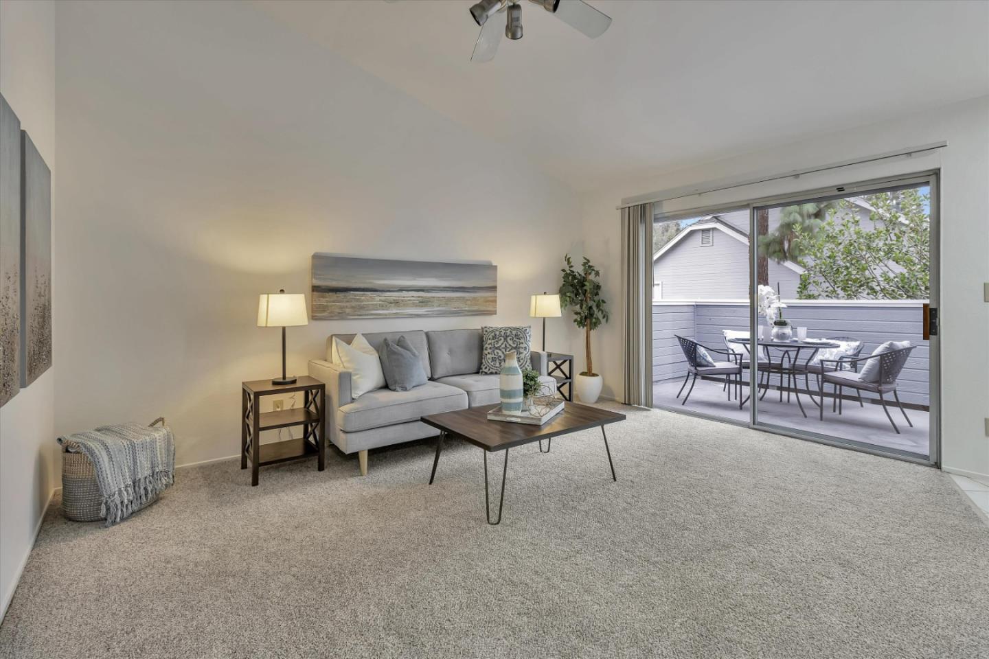 563 Shadow Dance Drive San Jose, CA 95110 - Photo 6 of 30 a living room with furniture and a large window