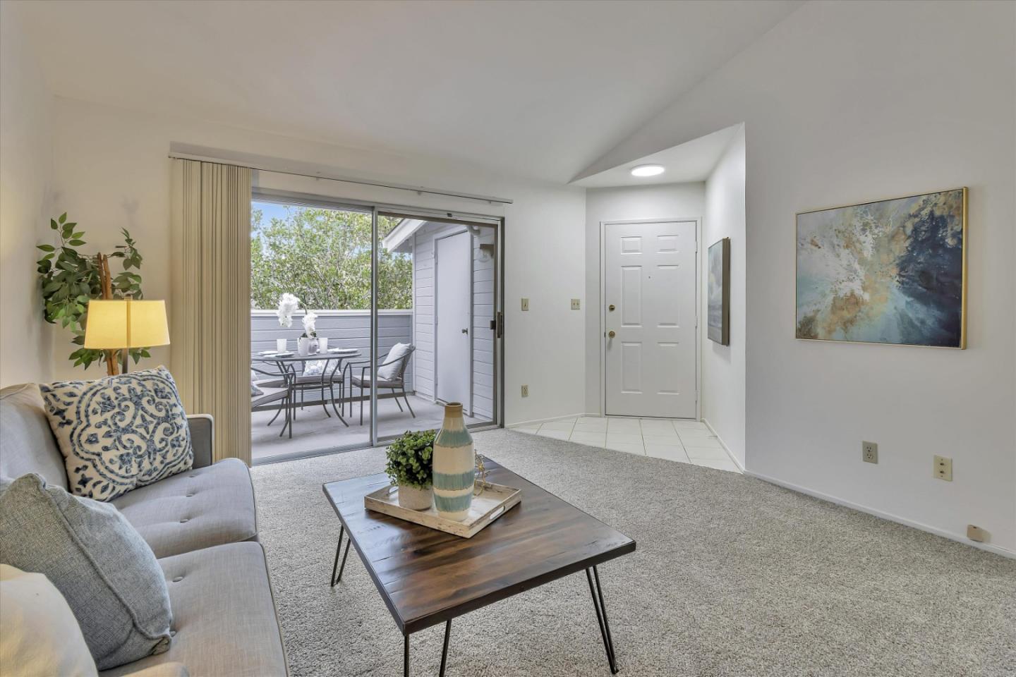 563 Shadow Dance Drive San Jose, CA 95110 - Photo 8 of 30 a living room with furniture and a potted plant