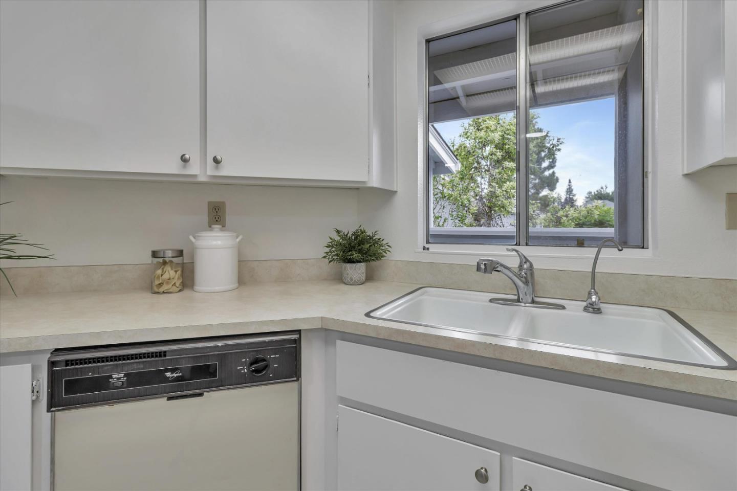 563 Shadow Dance Drive San Jose, CA 95110 - Photo 10 of 30 a close view of sink and cabinets