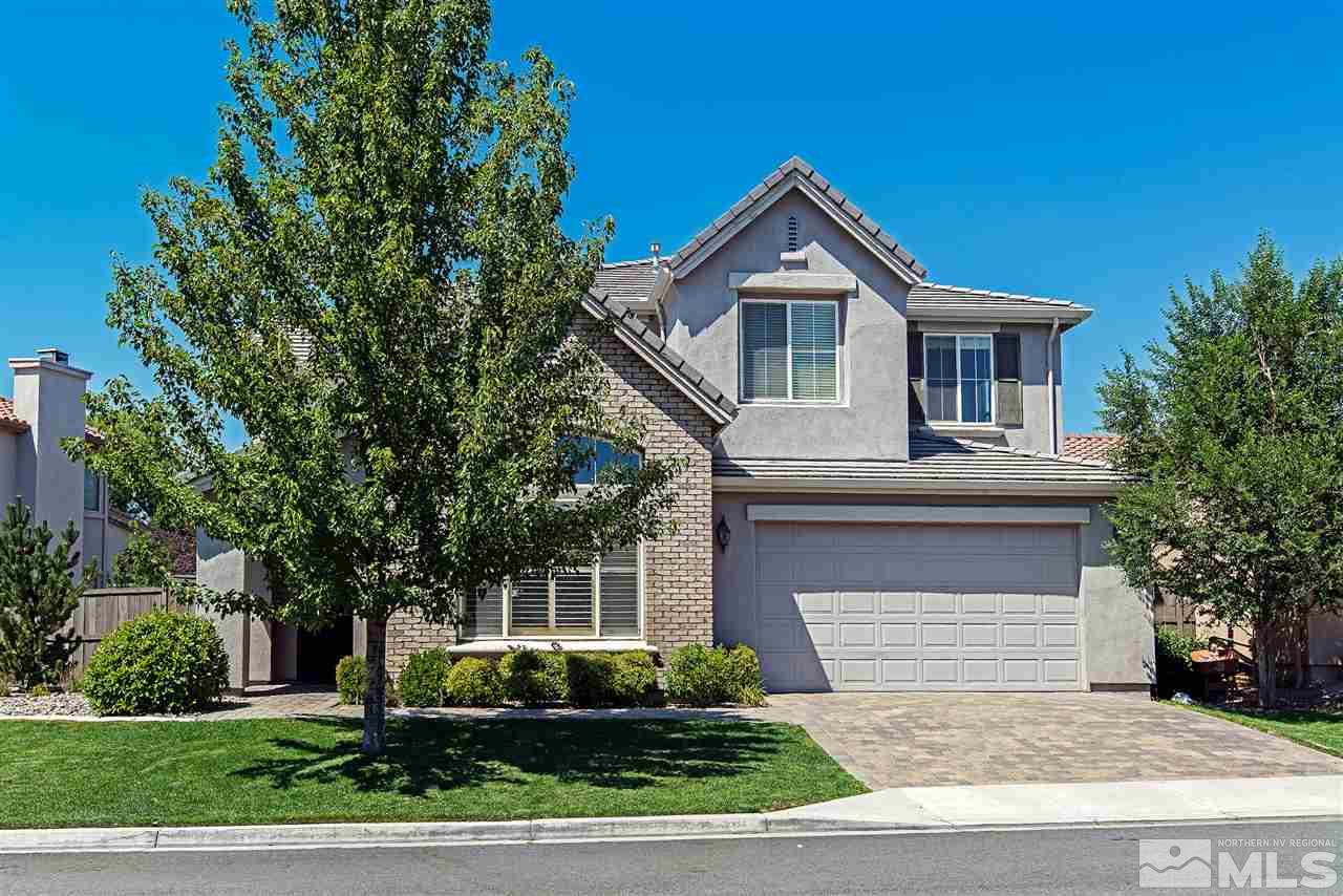 425 Parade Drive Reno, NV 89521 - Photo 1 of 1 a front view of a house with a yard