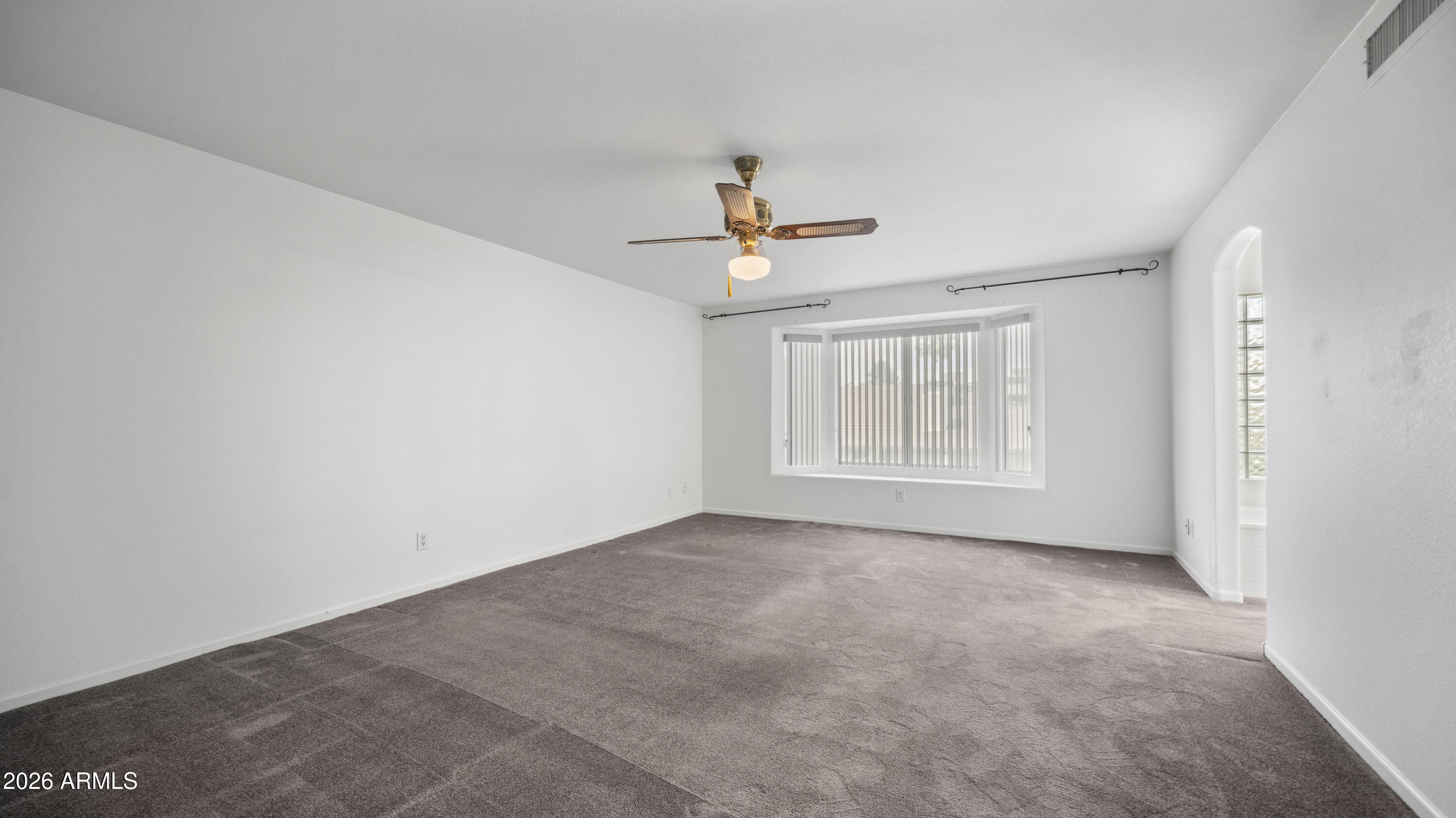 6620 West Redfield Road Glendale, AZ 85306 - Photo 29 of 33 a view of an empty room with a window