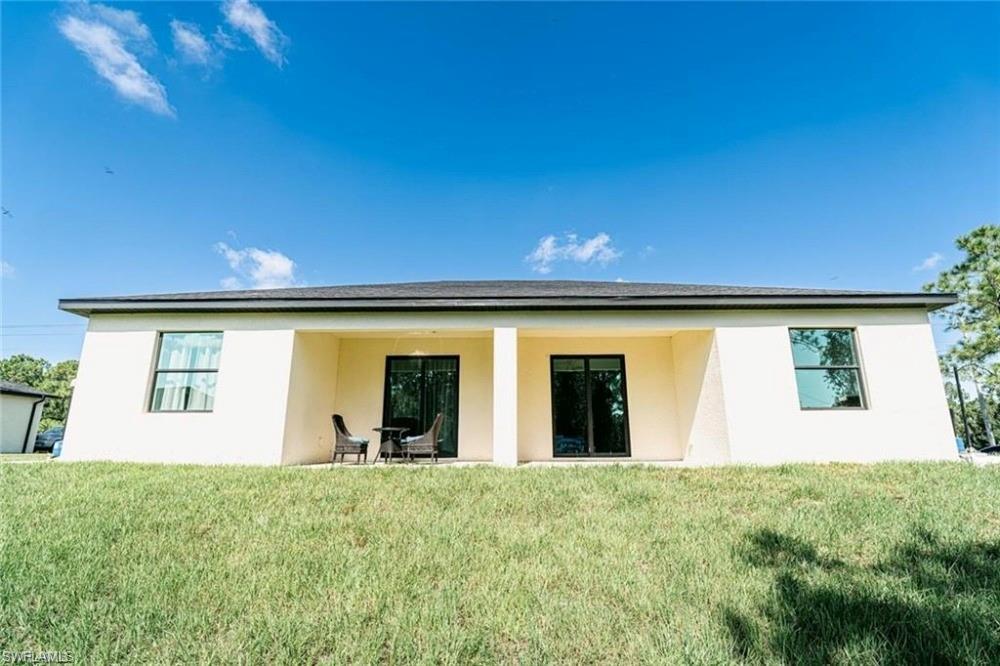 951 Graystone Avenue Lehigh Acres, FL 33974 - Photo 8 of 8 a view of an entryway of the house