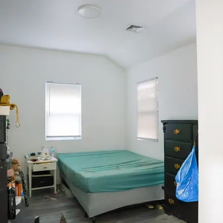 a room with toys and dresser