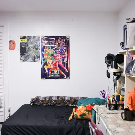 a bedroom with a bed and furniture