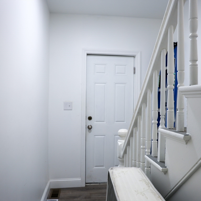 84 Cambridge Street Lowell, MA 01851 - Photo 6 of 42 a view of entryway with stairs