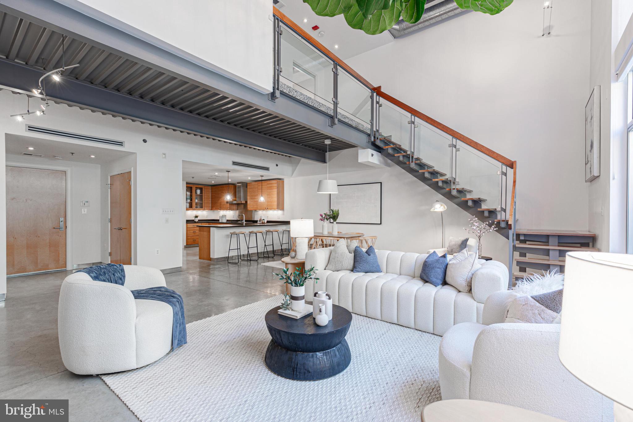 2351 Champlain Street Northwest, Unit C1 Washington, DC 20009 - Photo 17 of 34 a living room with furniture and a large window