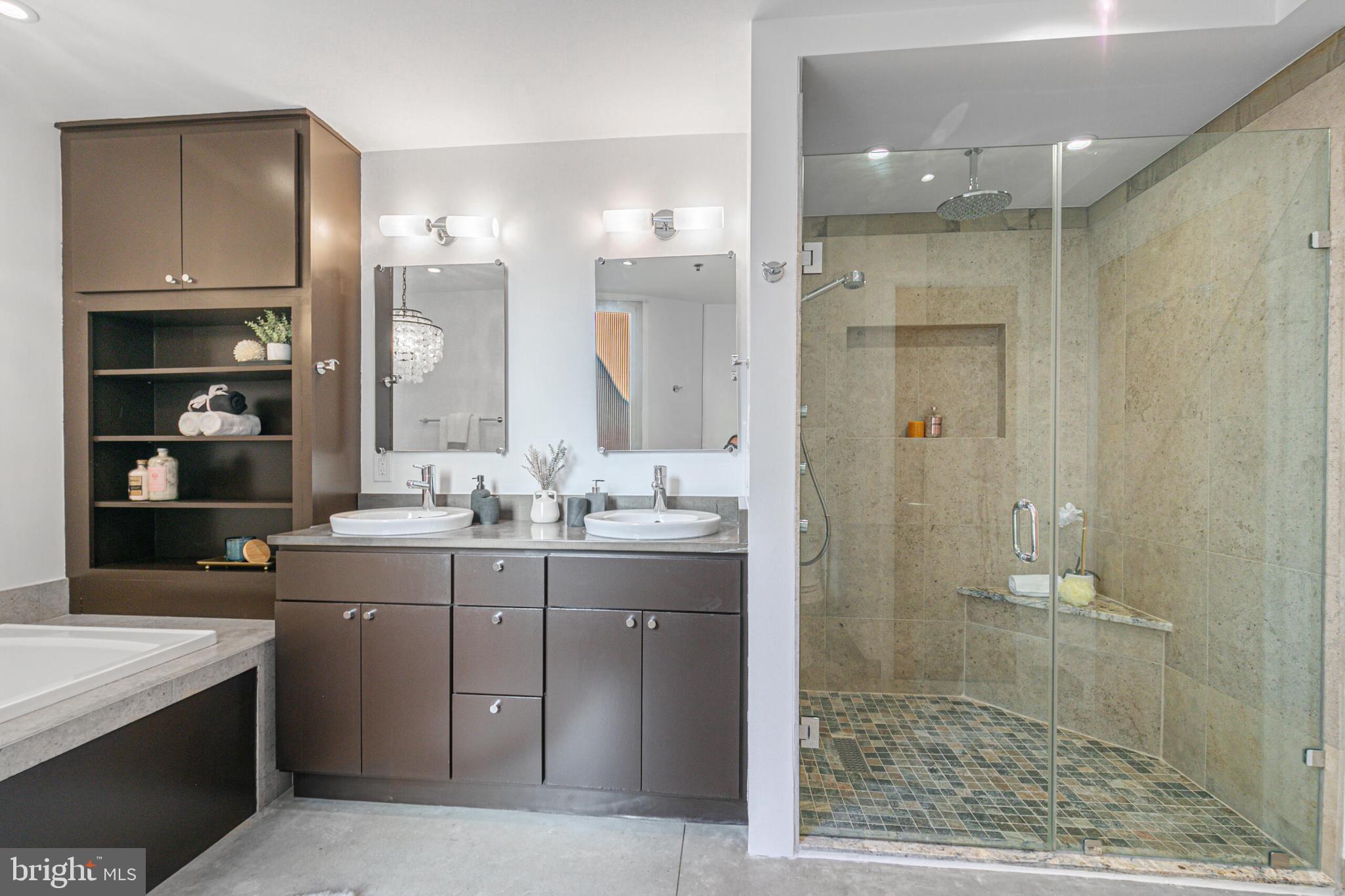 2351 Champlain Street Northwest, Unit C1 Washington, DC 20009 - Photo 23 of 34 a bathroom with a shower sink and mirror