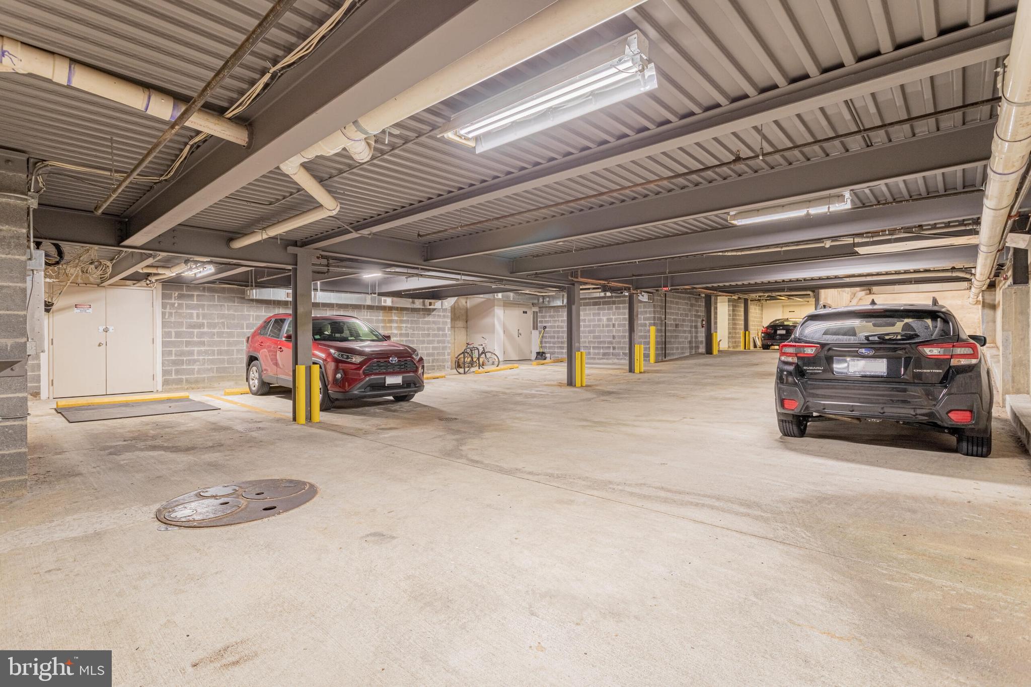 2351 Champlain Street Northwest, Unit C1 Washington, DC 20009 - Photo 33 of 34 a view of parking garage with cars