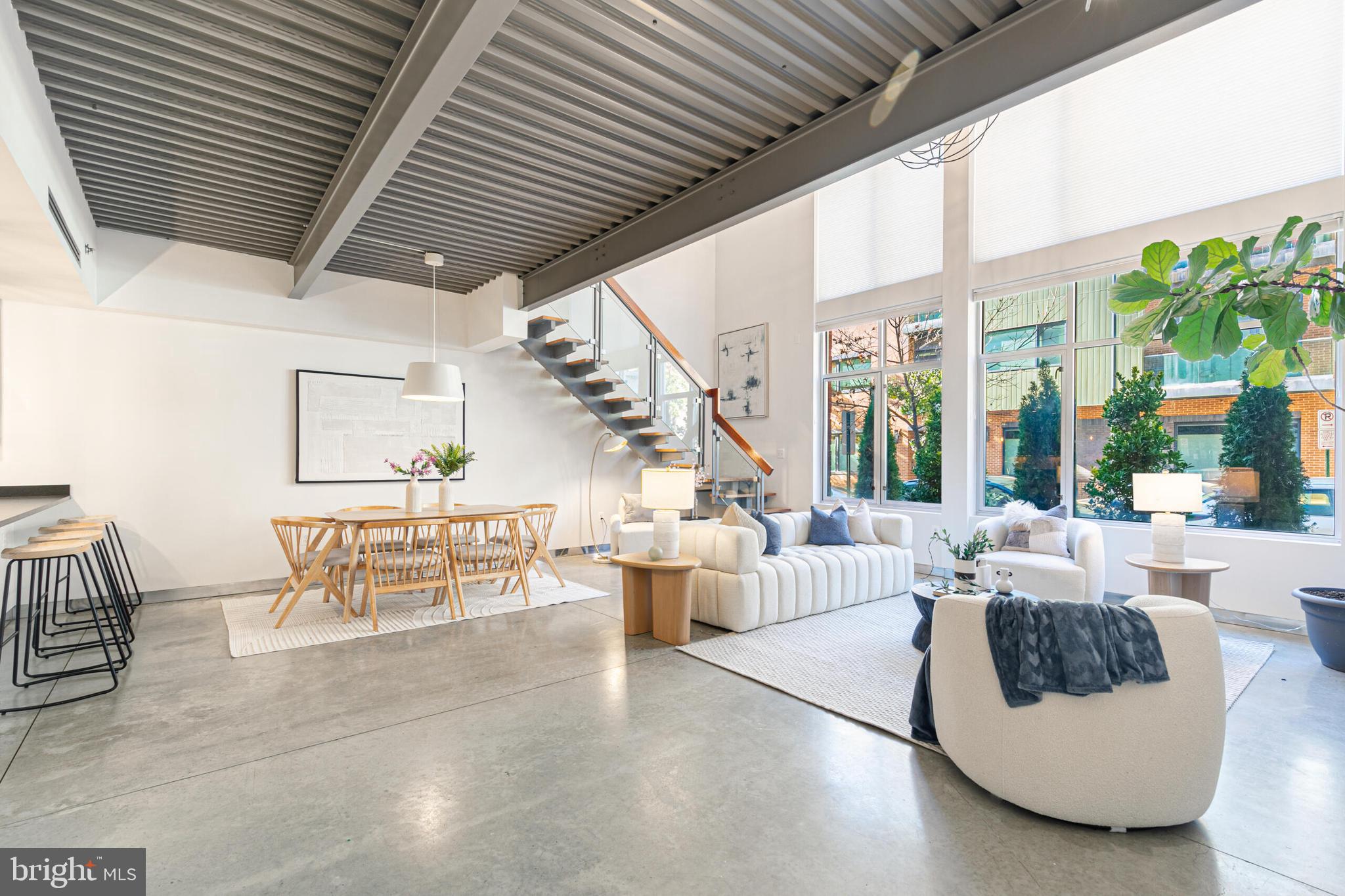 2351 Champlain Street Northwest, Unit C1 Washington, DC 20009 - Photo 4 of 34 a living room with furniture and wooden floor